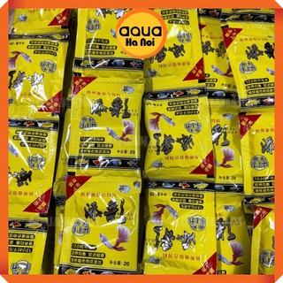Thức ăn cho cá 7 màu gói vàng 20g - Thức ăn cho cá cảnh các loại giúp cá mau lớn, lên màu, khoẻ mạnh