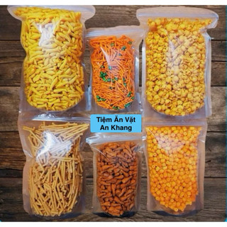  COMBO 1,8KG 6 Món Snack Bim Bim 6 Vị Khác Nhau Bao Gồm : Nui Chiên -Tăm Đậu -Ngó sen -Quẩy đùi gà -BimBim Cá -Xương Chó 