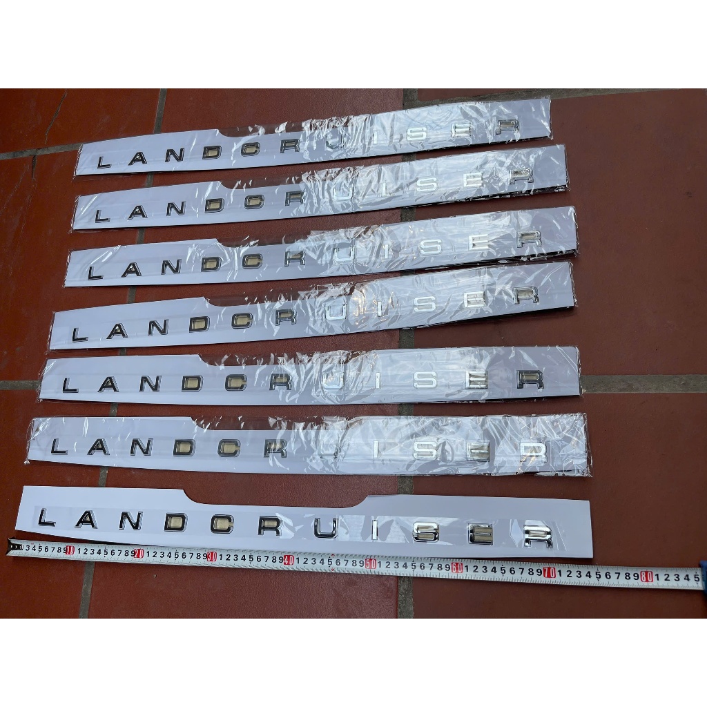 Logo chữ nổi LAND CRUISER mạ crome cao cấp dán nắp Cabo hoặc phía sau xe Land Cruiser