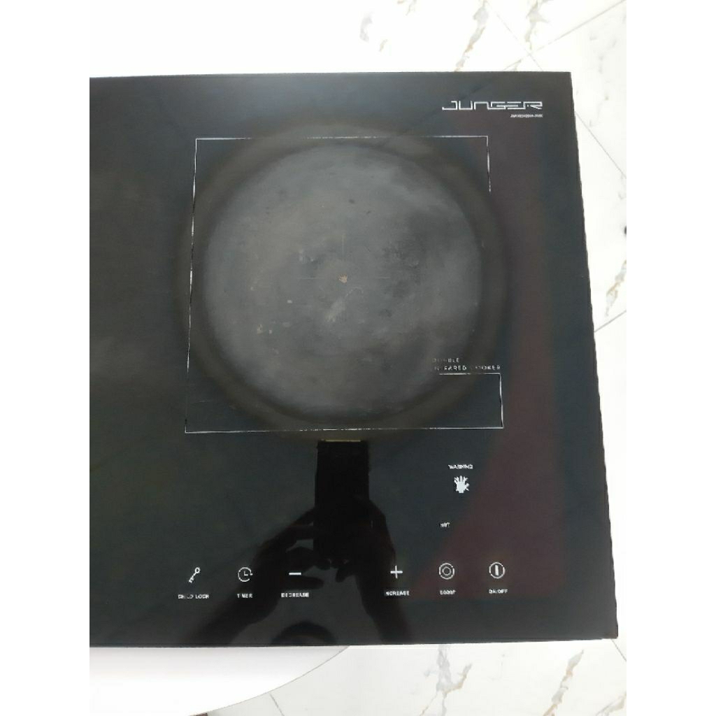 Mặt kính bếp điện từ Junger NKD 20 cũ.