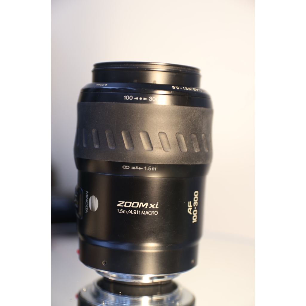 Lens Sony Ngàm A  Minolta 100-300mm Zi (phiên bản tích hợp mô tơ zoom xịn)