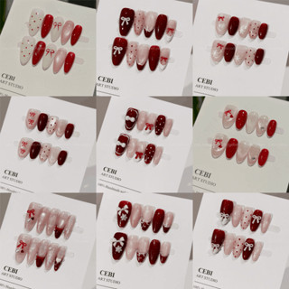  Nail box thiết kế c182 màu đỏ Tết nails tết vẽ tay đính nơ dễ thương cebi.nailbox 