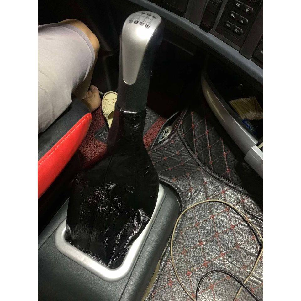 Bao da cần số Sitrak 420 da thật không bong nổ da - Chụp bụi cần số Howo Sitrak 420