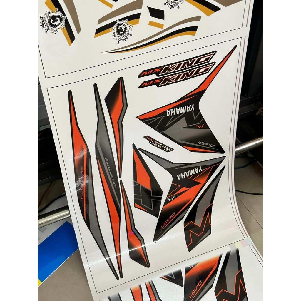 Tem UV ép nhiệt có siu mẫu Mxking cam đen