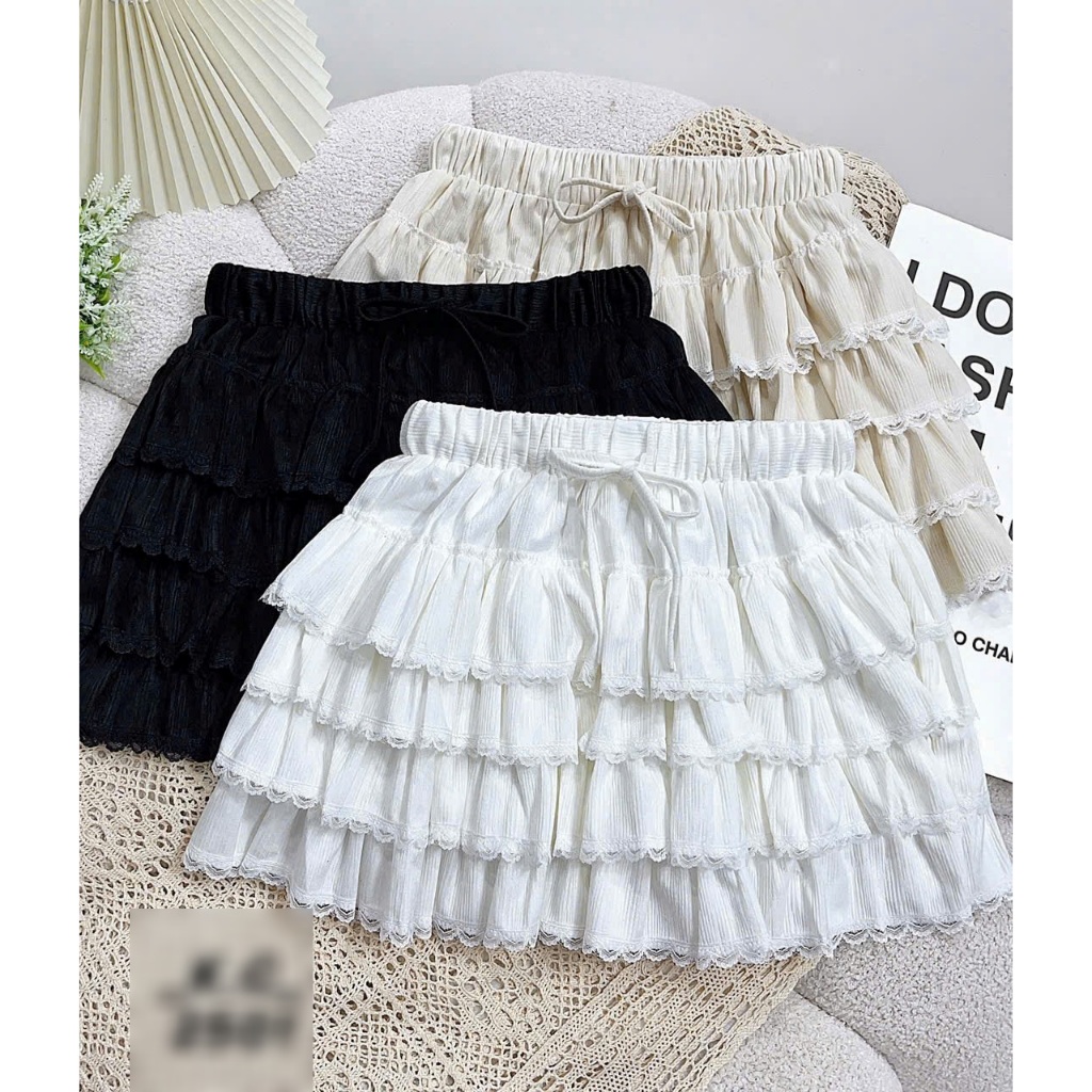 Chân váy dáng ngắn xòe tầng QC TOMBI SHOP