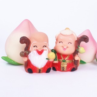 Tượng ông bà trái đào trang trí bánh kem mừng thọ