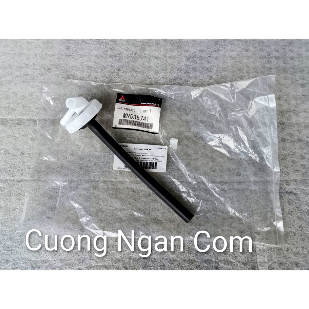 Nắp bình nước phụ (Cap radiator condenser tank) Pajero V73 V93 MR535741