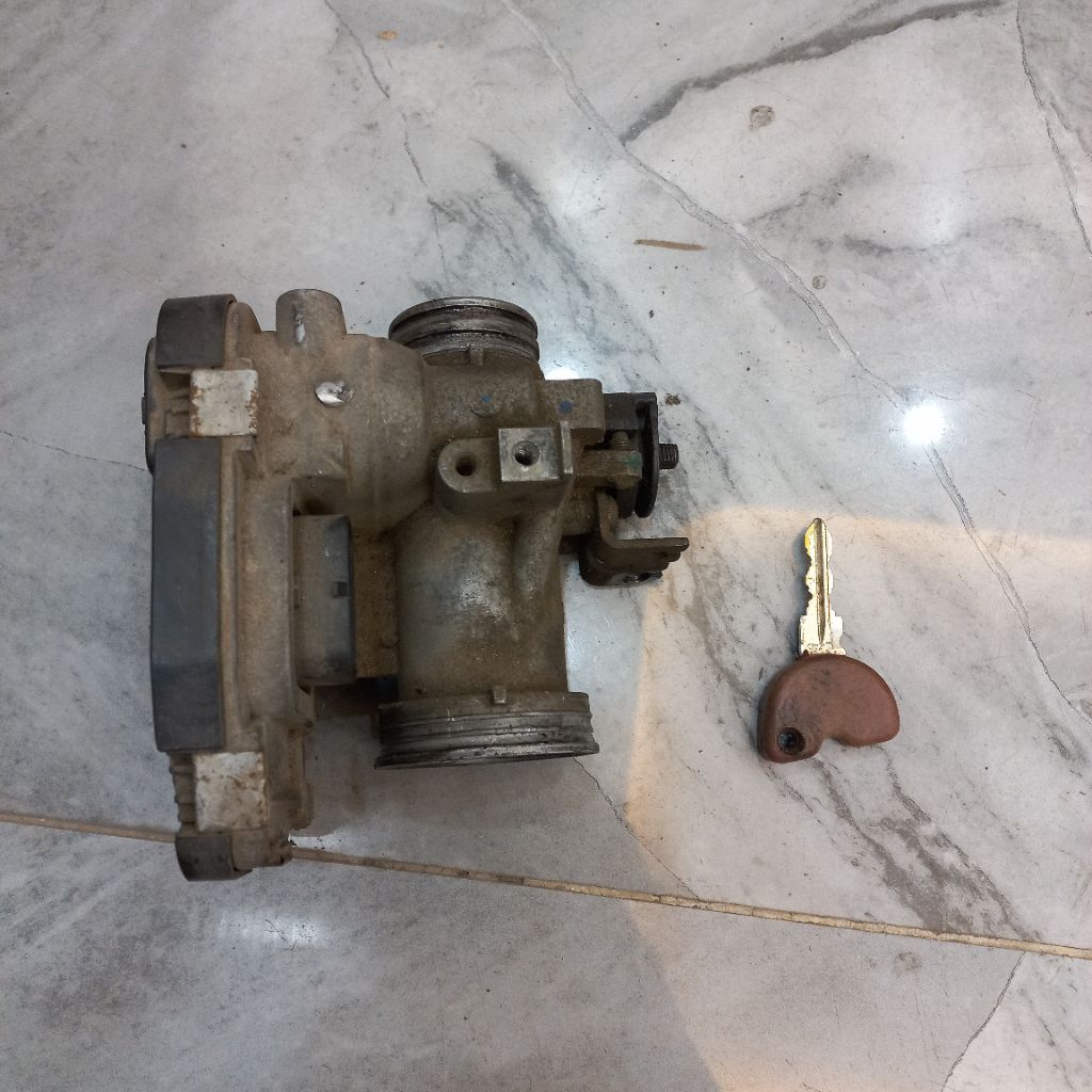 ic miu vespa lx125ie  kèm chìa khoá nâu tháo xe