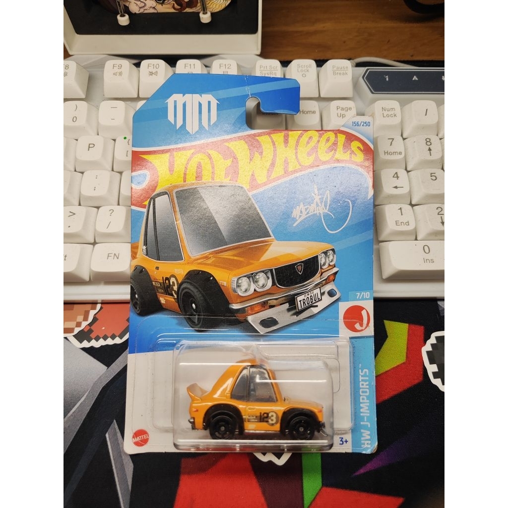 xe Hot Wheels basic Mazda RX-3 ( gấp móc)