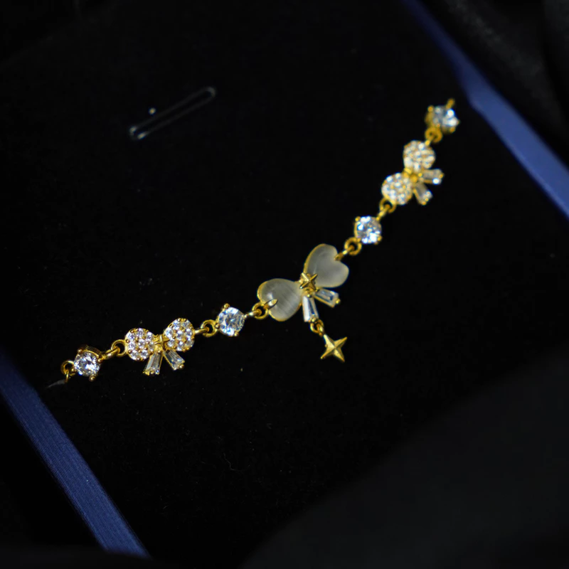 Lắc tay bạc nữ mạ vàng Nơ Hoàng Gia Asimi Royal Grace LT48 8