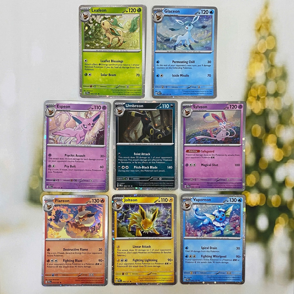 Thẻ hình Pokemon Eevee Evolves Cosmos Holo Promo từ hộp 8-tin Exclusive Prismatic Evolution