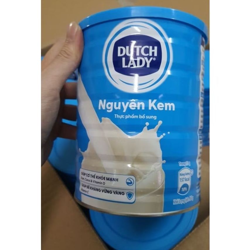 (bao bì mới) Sữa bột Cô gái Hà Lan nguyên kem 850g (Dutch Lady từ 6 tuổi trở lên)