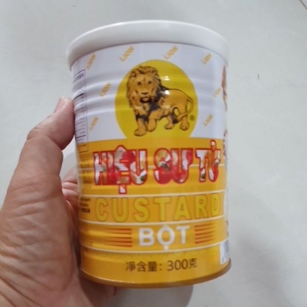 (04/03/2027) BỘT CUSTARD, HIỆU SƯ TỬ (LION CUSTARD POWDER), LON 300g
