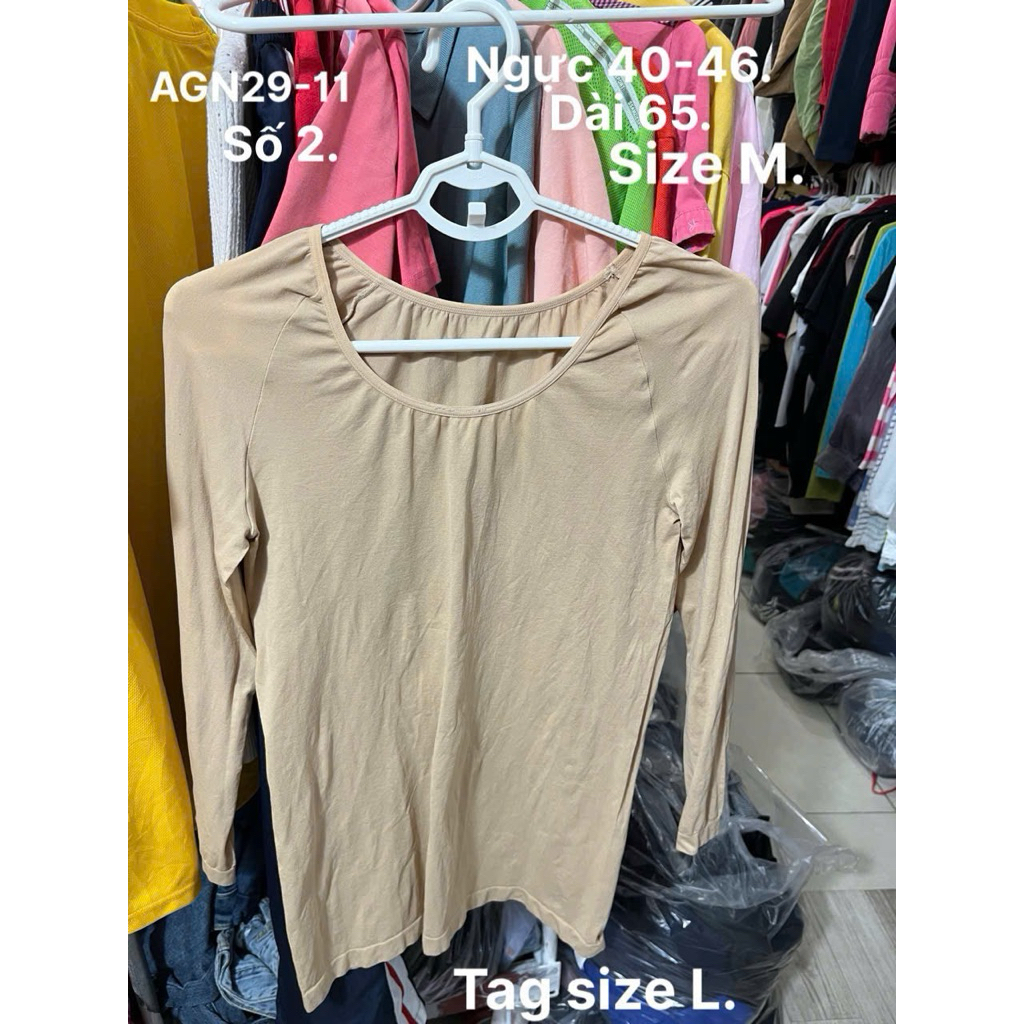 Hai áo giữ nhiệt Nhật nữ size M tag size L.