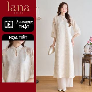  Áo dài Tết Tịnh Nghi La.na Design trắng kem tay bồng lửng dáng suông 2 tà cách tân gấm họa tiết phối tơ nhũ - SD384 