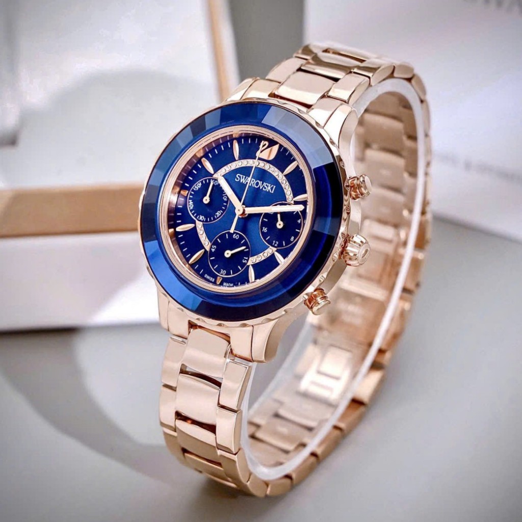 Đồng Hồ Nữ Swa Rovski Mặt Xanh Viến Đá Xanh Vỏ Vàng Hồng Size 39mm