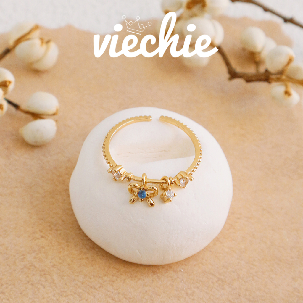 [FREESIZE] Nhẫn nữ TWINKLE nơ vàng tòn ten đính đá xanh mạ vàng 18K VIECHIE R0200