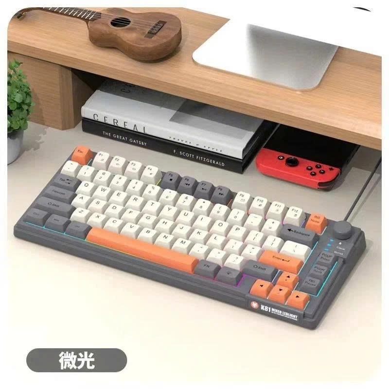 Bàn phím có dây K81 giả cơ gaming có núm xoay chỉnh âm lượng thiết kế có đèn led 7 màu kèm theo nút vặn âm lượng
