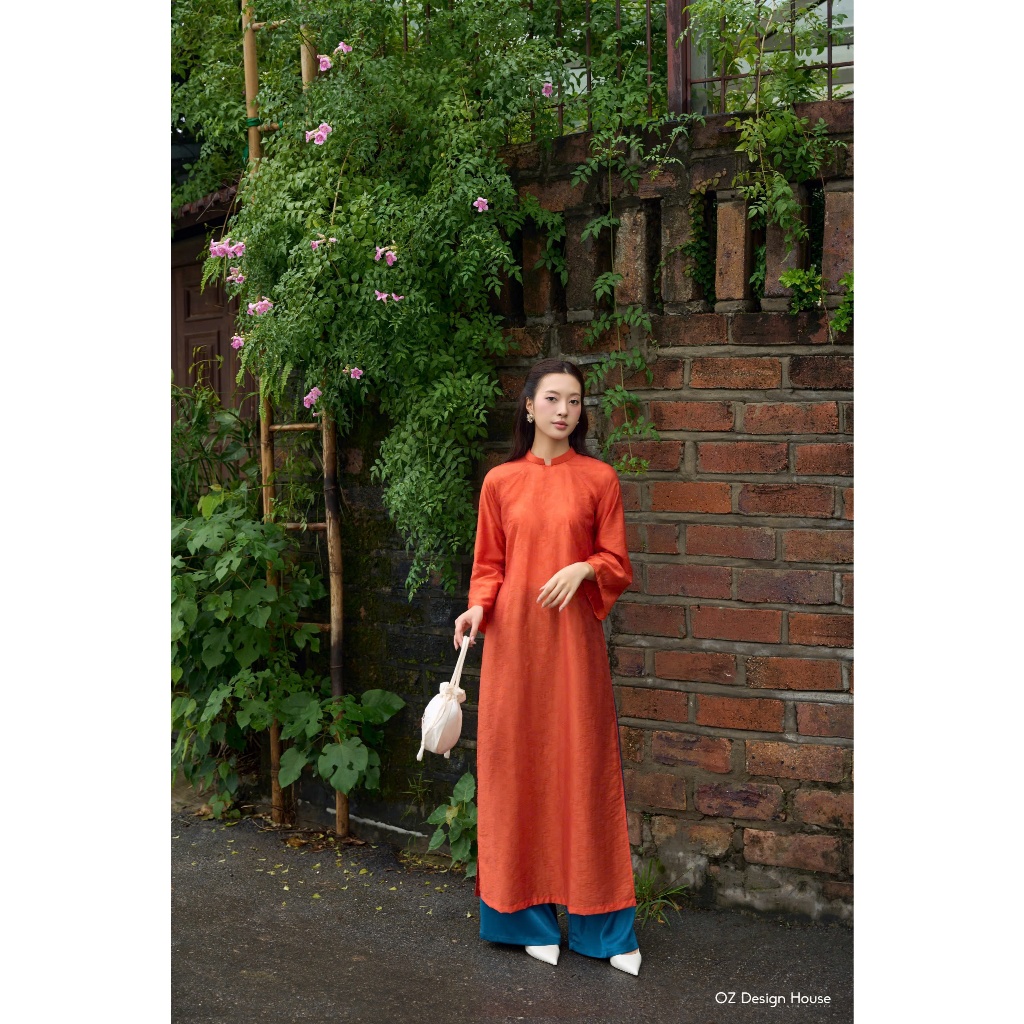 Áo dài OZ Design House AD44905TKE25 lụa tencel cổ tầu hoạ tiết lá chìm màu cam