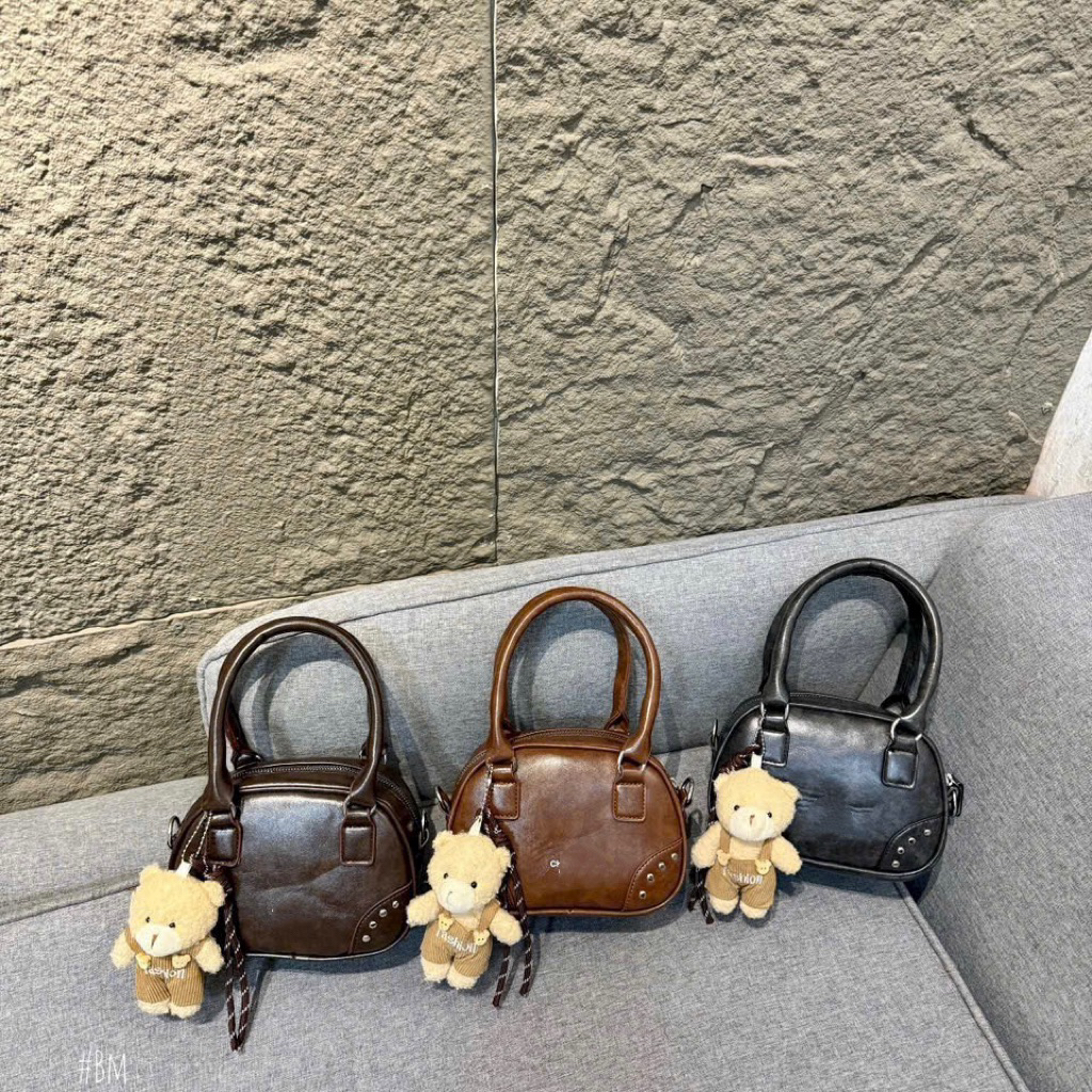 Túi xách nữ đeo chéo dáng tròn kèm gấu siêu xinh đựng đồ thoải mái tiện dụng .TT600TK.