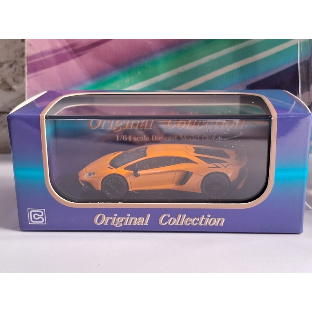 KYOSHO 1/64 - LAMBORGHINI AVENTADOR SV MÀU CAM - LIMITED EDITION