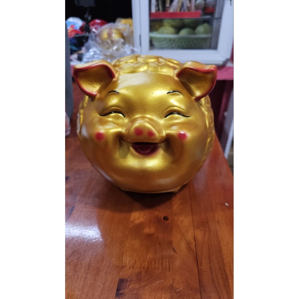 Heo đất tiết kiệm đồng tiền vàng