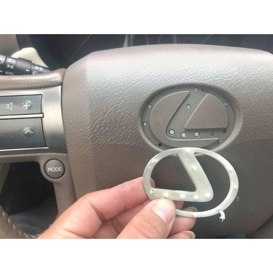 Biểu Tượng Lexus Trên Vô Lăng Xe Lexus LX570 - Logo Lexus Trên Nút Còi Lexus LX570