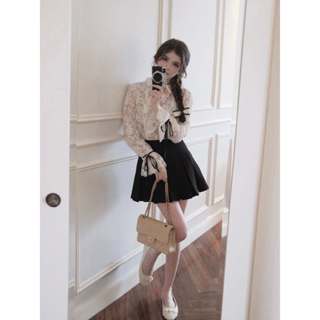  ARA - Chân váy xòe xếp ly bản to đính nơ hông Ivy Skirt Cv69 