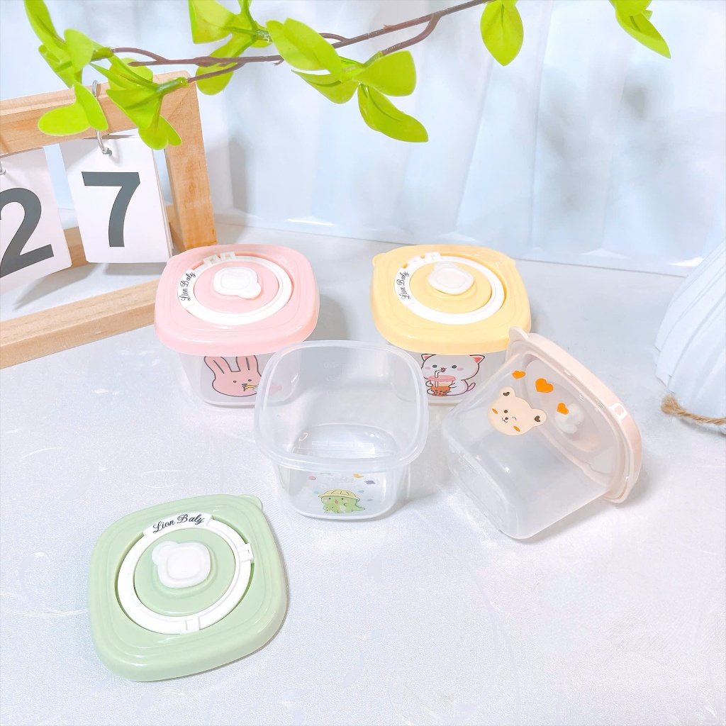 Set 2 hũ trữ thực phẩm Lion Baby và Máy hâm sữa