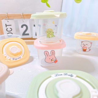 Set 2 hũ trữ thực phẩm Lion Baby và Máy hâm sữa