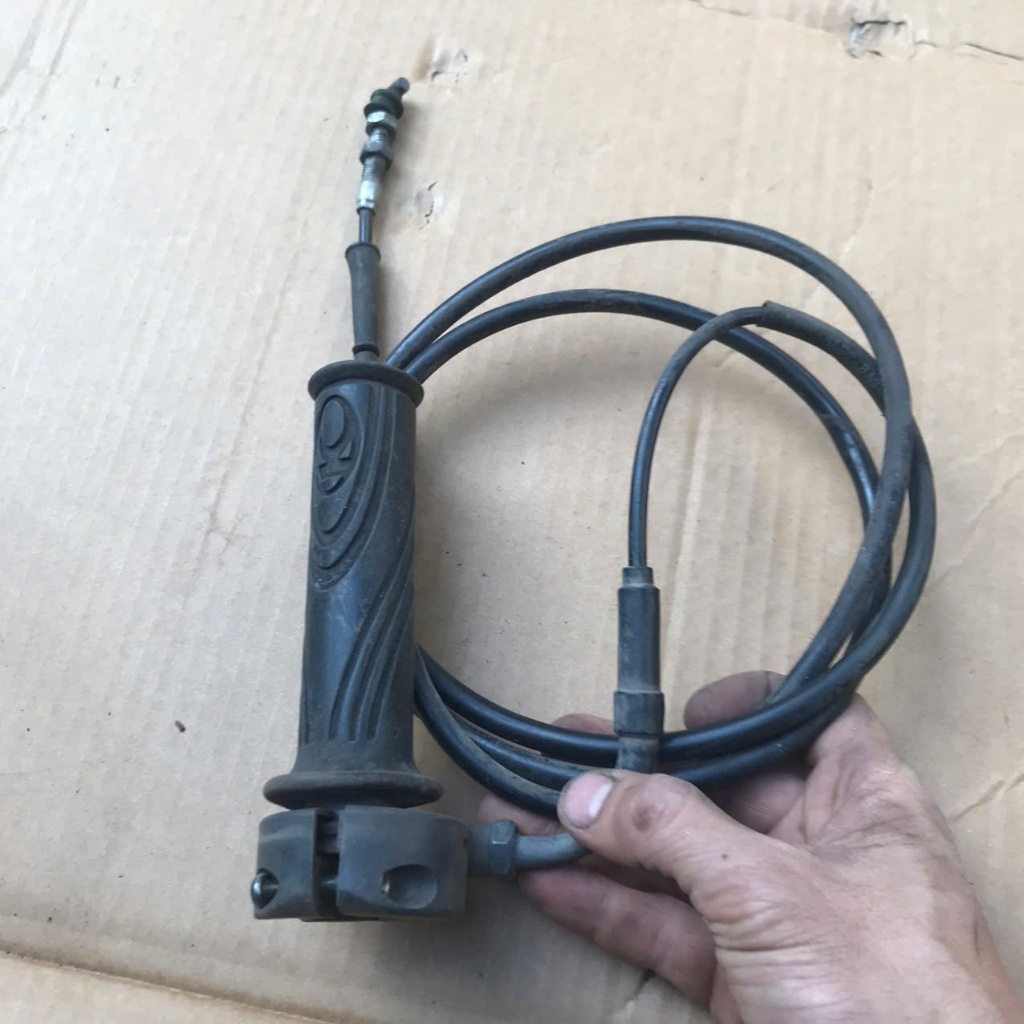 cụm tay ga ống ga ,kèm dây ga kymco candy hi/life (hàng zin tháo xe )