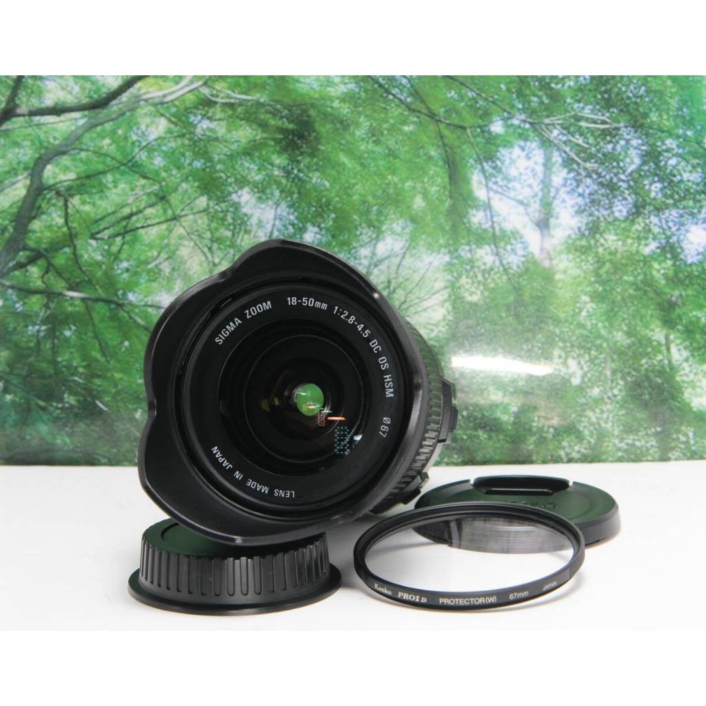 Ống kính Sigma 18-50mm F2.8-4.5 DC HSM canon efs - sigma mount (Mới đẹp và fillter bảo vệ 67mm)