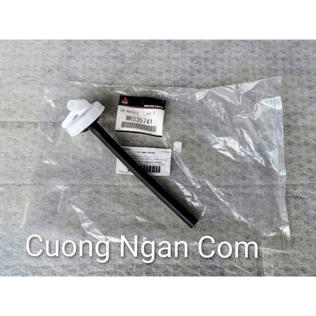 Nắp bình nước phụ (Cap radiator condenser tank) Pajero V73 V93 MR535741