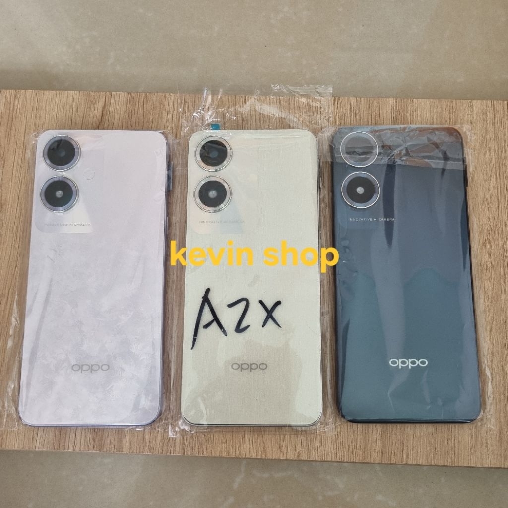 Vỏ / Nắp lưng Oppo A2x kèm khung viền, kính camera có khe sim