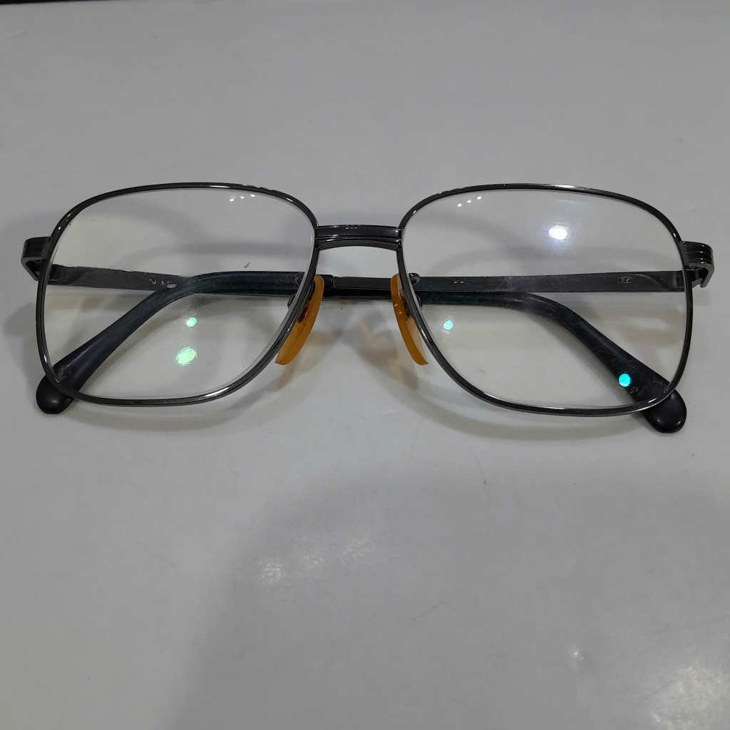 Gọng kính nhật nam NIKON thép không gỉ ngang kính 135mm đã qua sữ dụng.