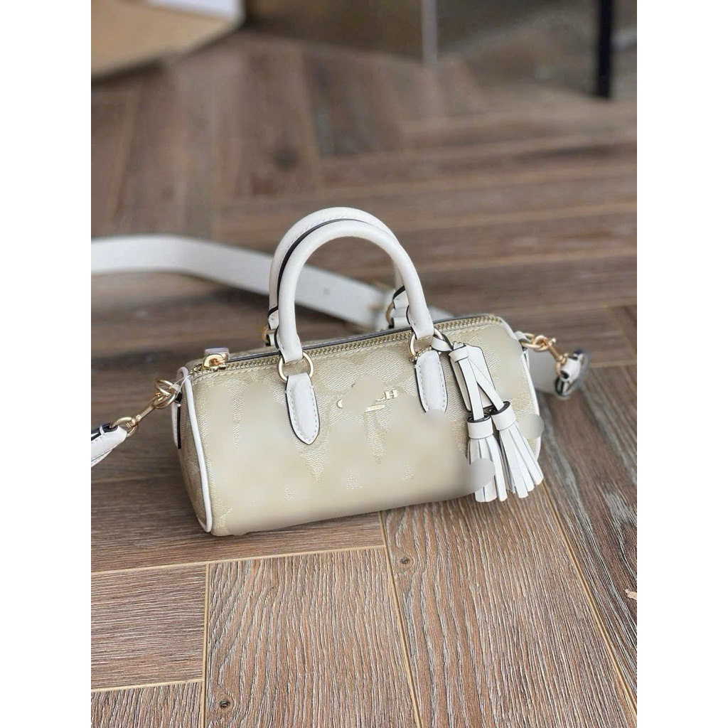 Túi trống mini LACEY CROSSBODY IN SIGNATURE CANVAS