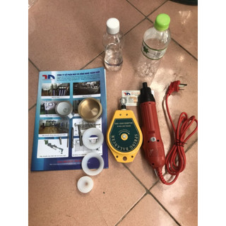 Máy vặn nắp chai cầm tay