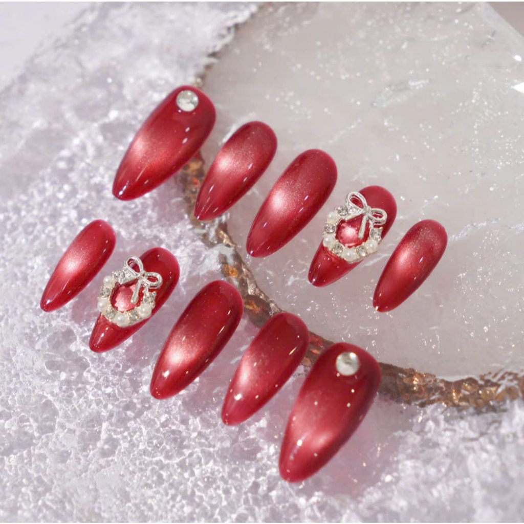 (M235) Nailbox mắt mèo đỏ đính charm nơ