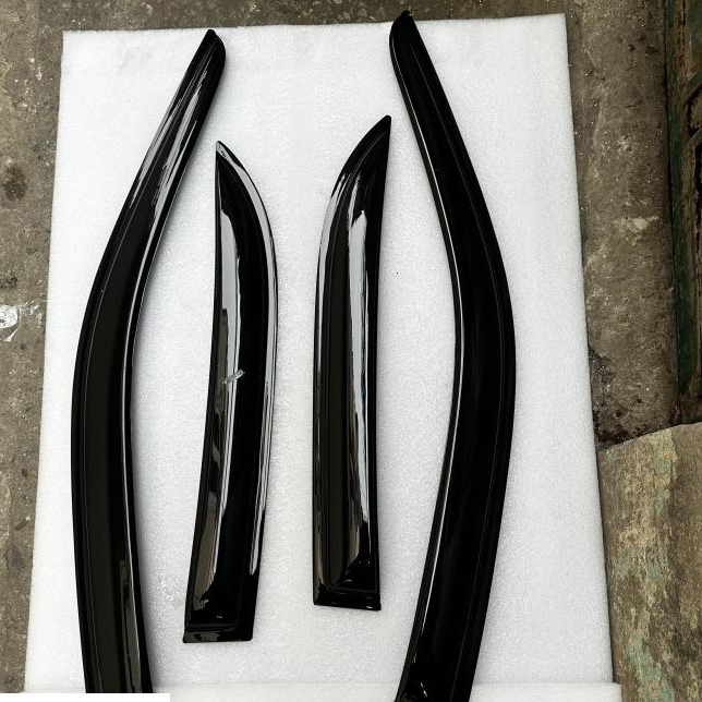 Vè che mưa Ford Laser. Dè mưa Laser cao cấp