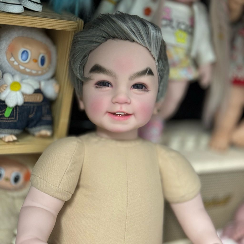 Doll 22in mẫu bé trai thân bông mắt tít cao cấp.Tặng kèm đòi thun