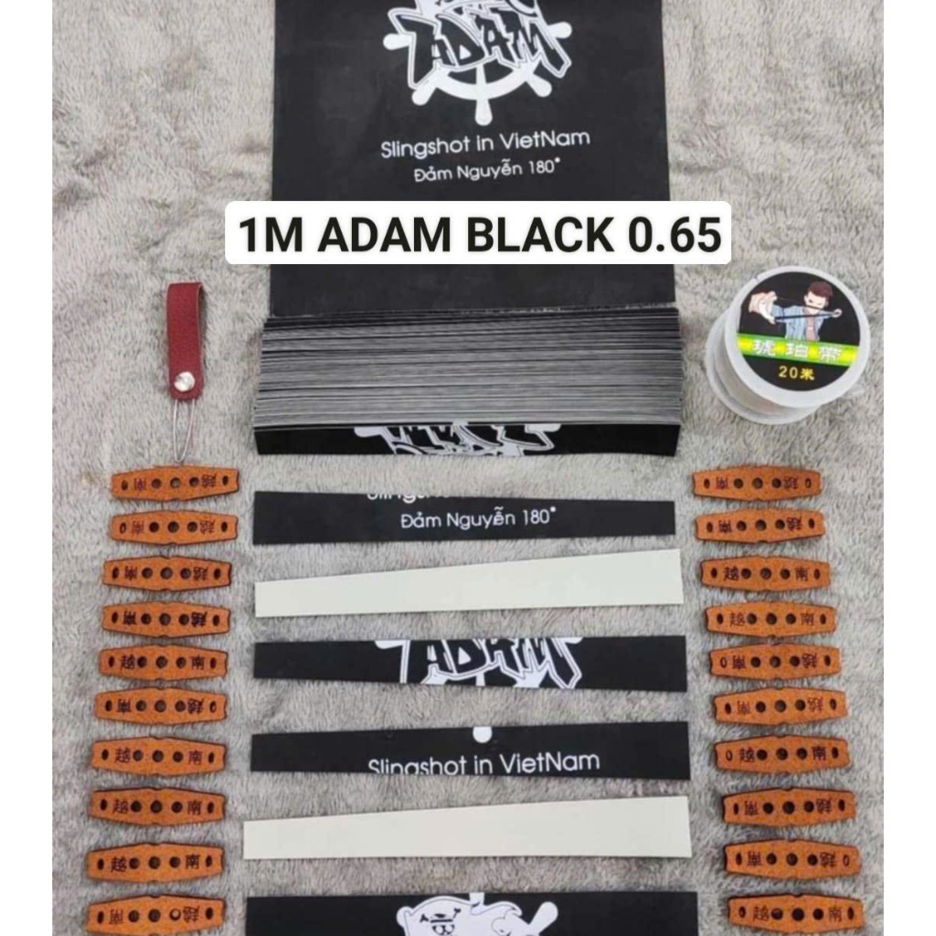 ADAM BLACK - SIÊU HÓT COM BO 1M DÂY NÁ CAO SU HÃNG ADAM BLACK 0.65 KÈM 20DA NÂU 1 CUỘN DÂY CỘT VÀ 1 