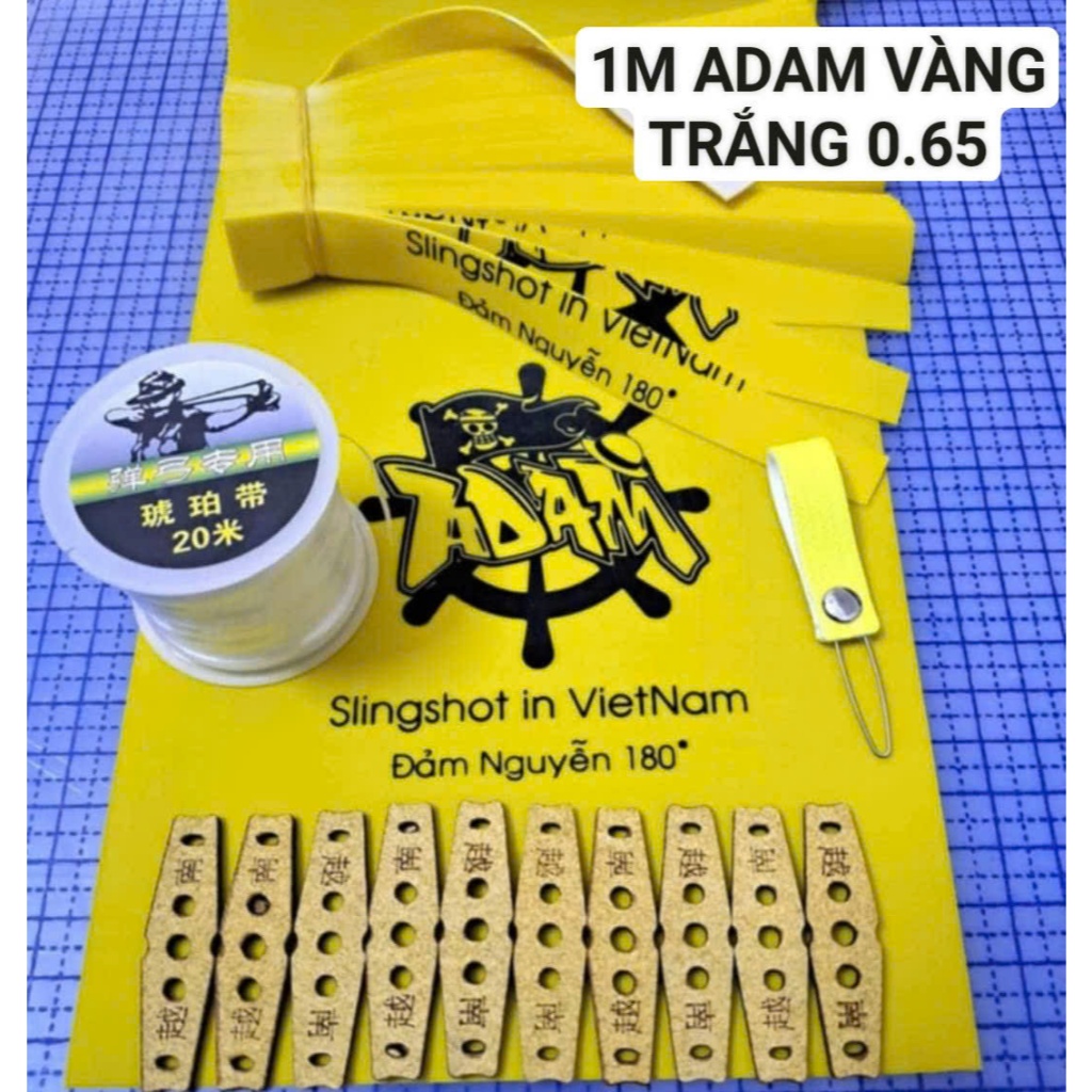 ADAM VÀNG - SIÊU HÓT COM BO 1M DÂY NÁ CAO SU HÃNG ADAM VÀNG 0.65 KÈM 20DA NÂU 1 CUỘN DÂY CỘT VÀ 1 LU