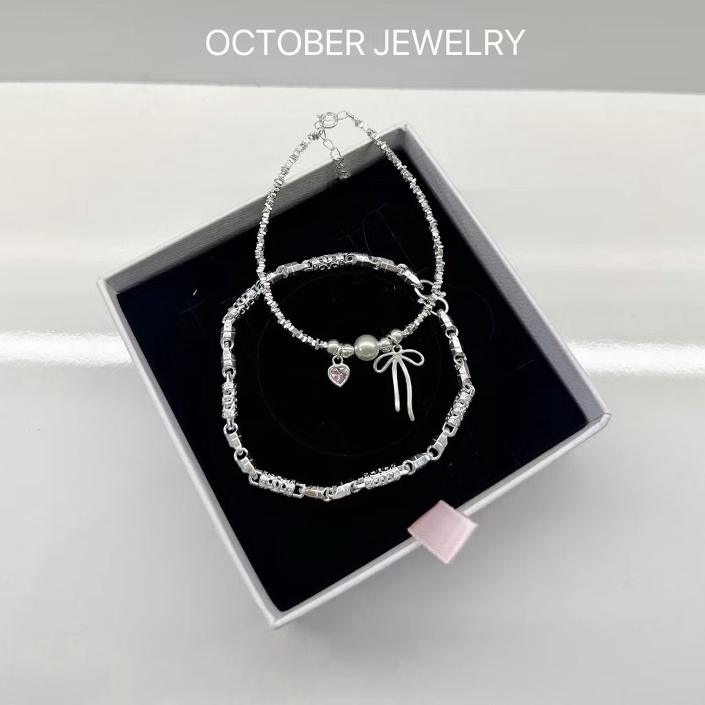 Lắc đôi OCTOBER JEWELRY nơ mix tim hồng bạc thật