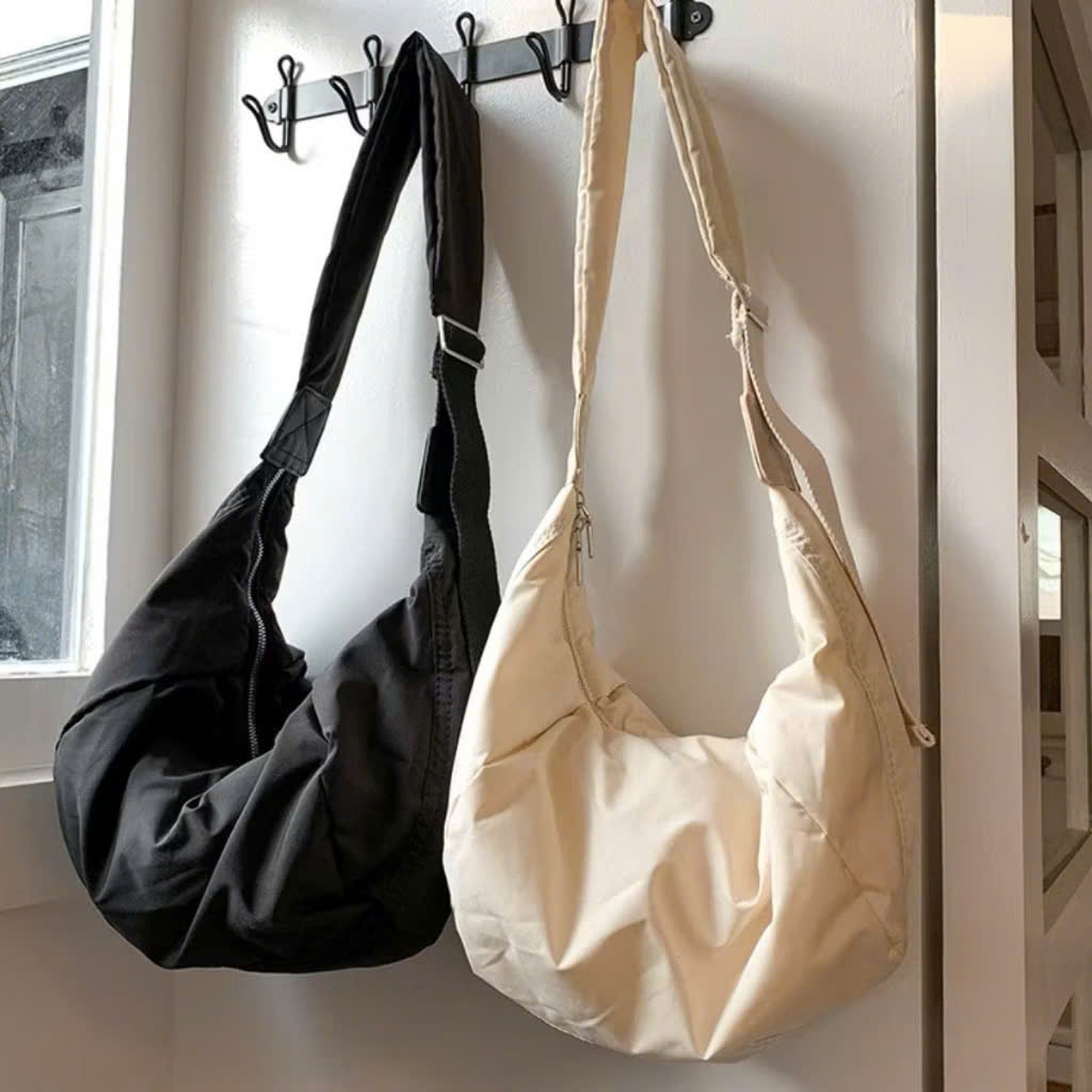 Túi đeo chéo hình bầu vải dù kháng nước đi học đi chơi unisex nam nữ đựng sách khoá zip