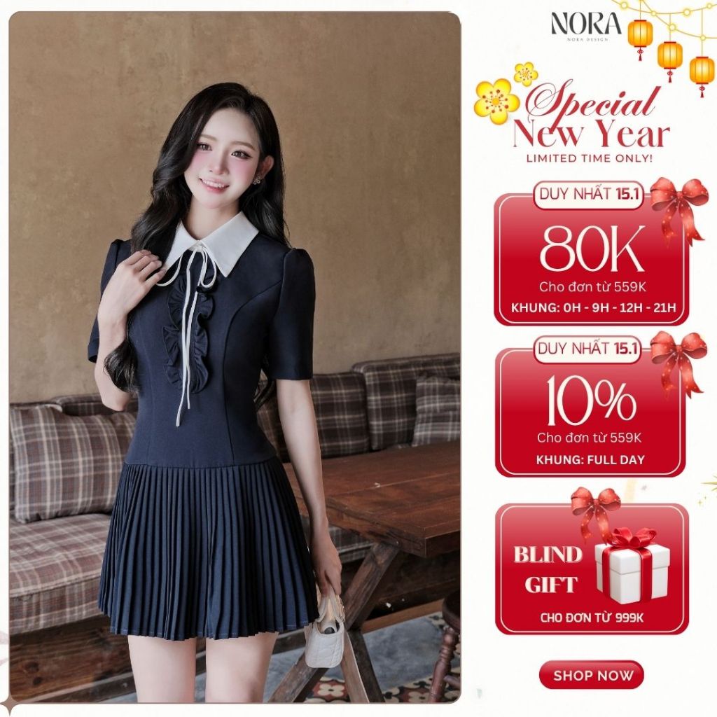 Váy Nữ Dáng Ngắn Chất Chéo Rubi NORA, Đầm Cổ Sơ Mi Nhún Bèo Ngực, Tùng Váy Dập Ly Phong Cách Công Sở