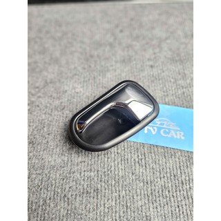 Tay mở cửa trong Ford Laser, Mazda 323