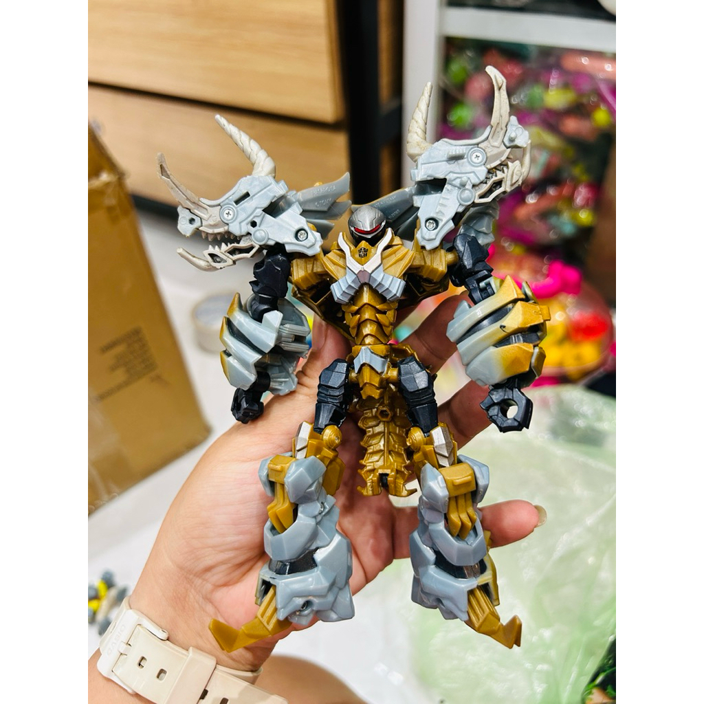 Mô hình Transformers Deluxe Dinobot Slug The Last Knight Premier Edition