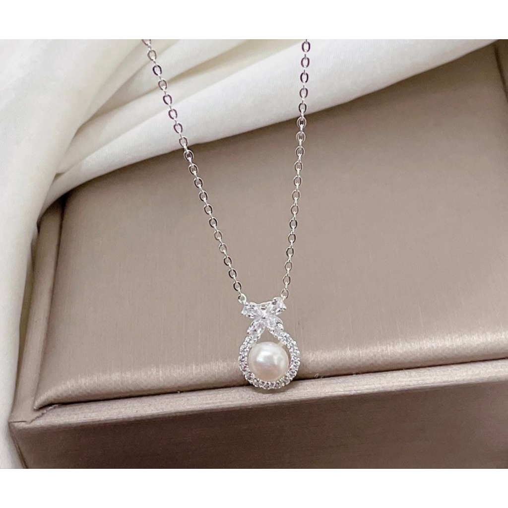 Dây chuyền bạc mặt trai nuôi
