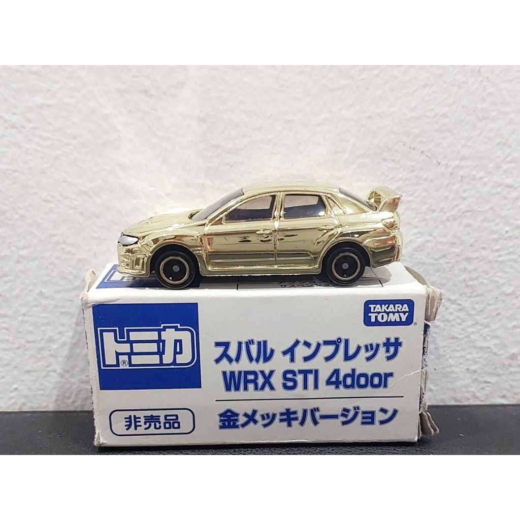Xe mô hình Tomica Subaru Impreza WRX STI 4door Gold-Plated Version (Tomica Expo 2015) - Made in Viet