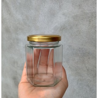 Sỉ - 120 - Hũ Lục Giác 180ml - Thủy tinh nắp thiếc màu Đen , Vàng.
